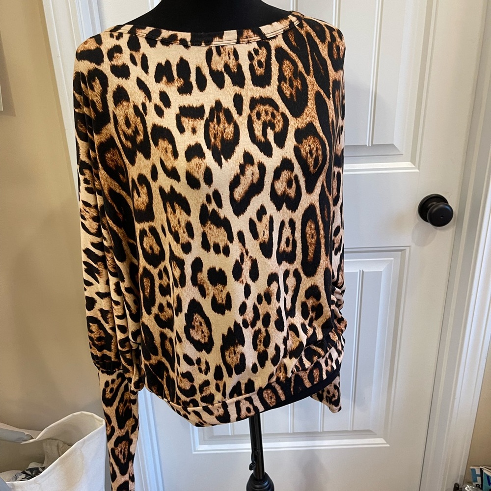 Peach Love Animal Print Blouse. NWOT Small (fits medium and some larges)